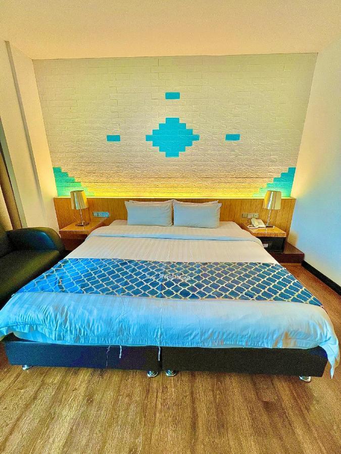 New World Express Motel บินตูลู ภายนอก รูปภาพ
