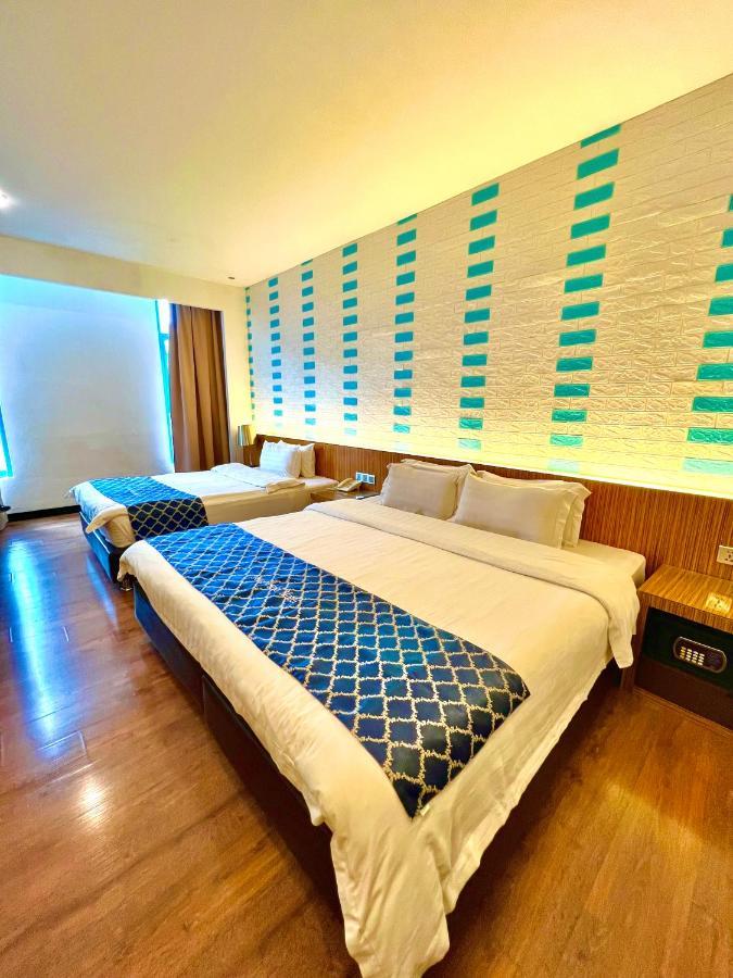 New World Express Motel บินตูลู ภายนอก รูปภาพ
