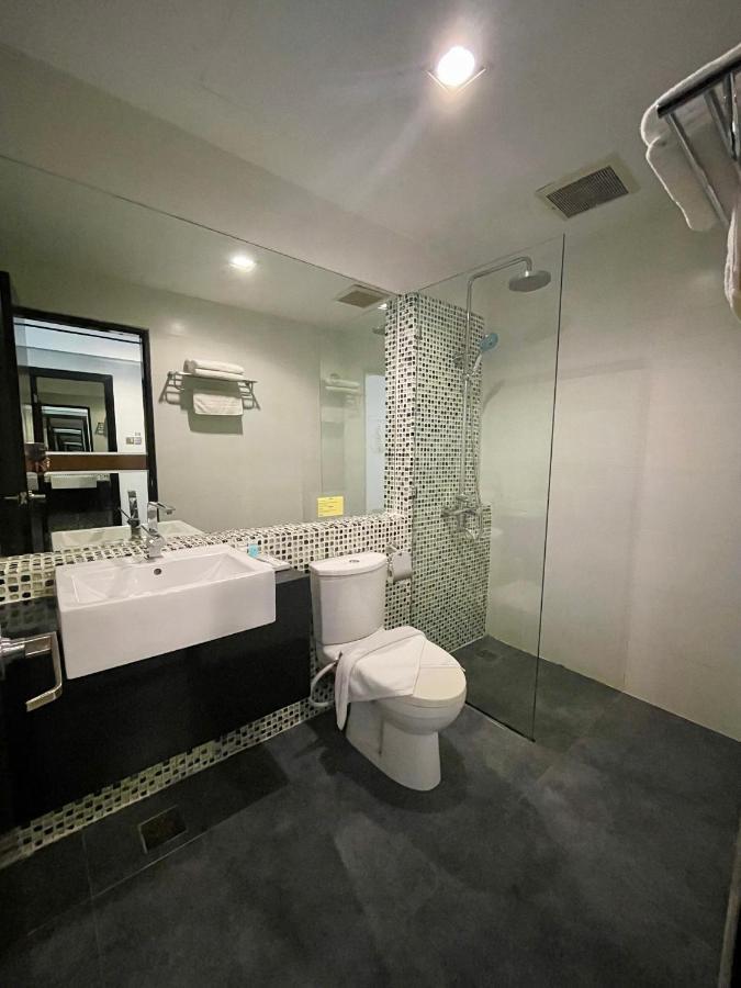 New World Express Motel บินตูลู ภายนอก รูปภาพ