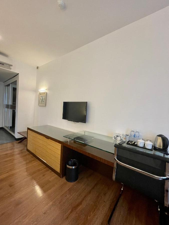 New World Express Motel บินตูลู ภายนอก รูปภาพ