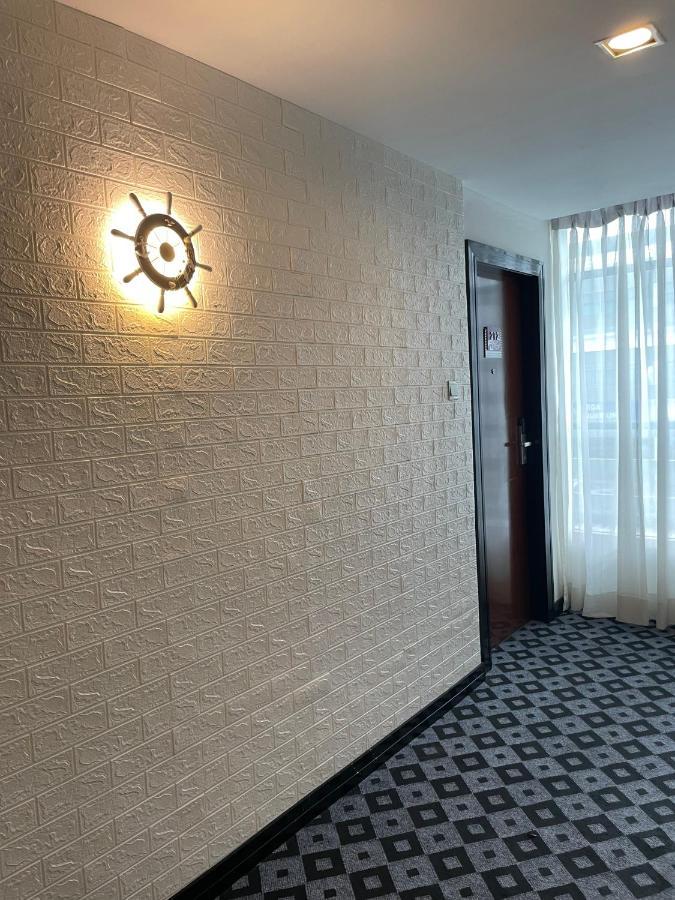 New World Express Motel บินตูลู ภายนอก รูปภาพ